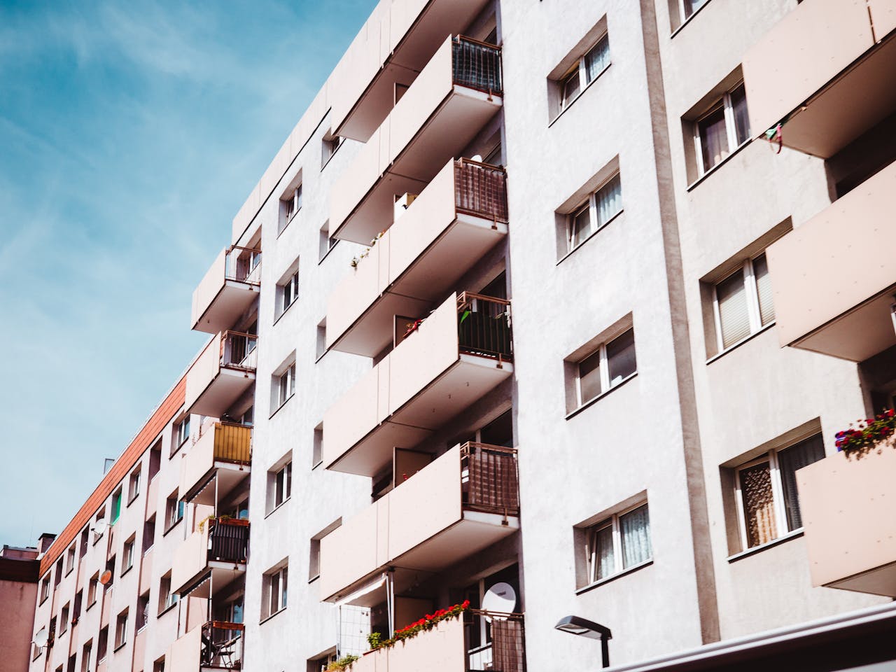 who-we-are Contemporary apartment building with balconies in an urban setting, Frankfurt am Main.